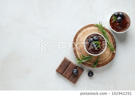 Concept of delicious and sweet food - chocolate mousse Concept of delicious and sweet food - chocolate mousse 102942291