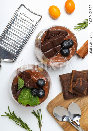 Concept of delicious and sweet food - chocolate mousse Concept of delicious and sweet food - chocolate mousse 102942293