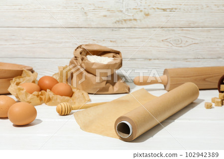 Concept of accessories for cooking and baking - baking paper Concept of accessories for cooking and baking - baking paper 102942389