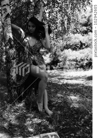 Portrait of an young beautiful sexy woman on the nature 102942605