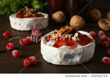 Concept of delicious French food - Camembert cheese Concept of delicious French food - Camembert cheese 102942759