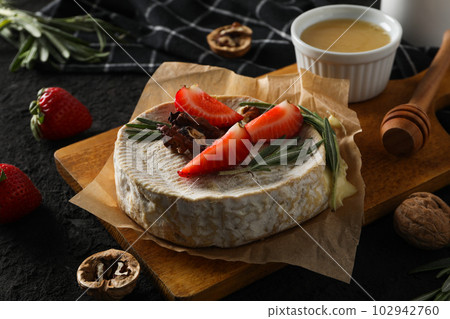 Concept of delicious French food - Camembert cheese Concept of delicious French food - Camembert cheese 102942760
