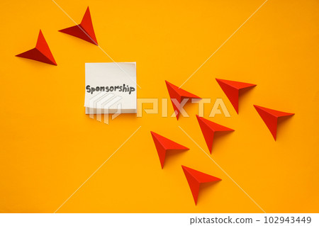 Concept of sponsorship with paper planes on yellow background Concept of sponsorship with paper planes on yellow background 102943449