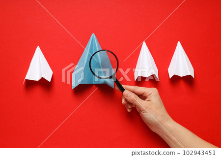 Business, startup and sponsorship concept with paper planes on red background Business, startup and sponsorship concept with paper planes on red background 102943451