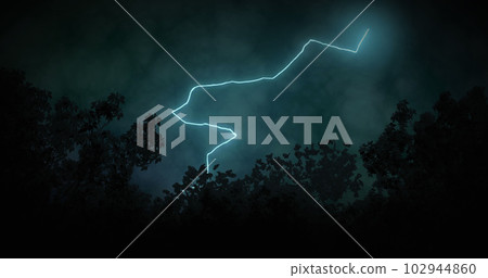 Image of lightning striking over trees and stormy clouded sky 102944860