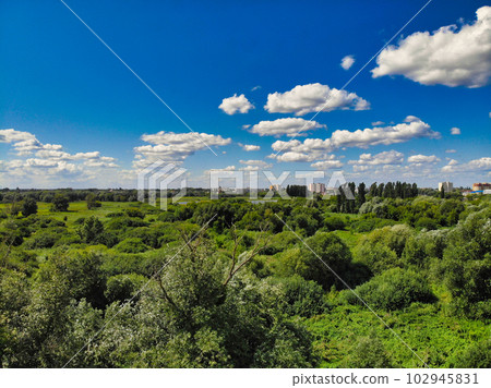 The top view of Jatujak park in Bangkok city. In the morning people are love coming to exercise here. The garden is designed in to the geometry of circular and triangle look like peaceful sign. 102945831
