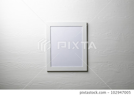 White empty frame with copy space on white wall 102947005