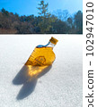 whiskey covered in snow 102947010