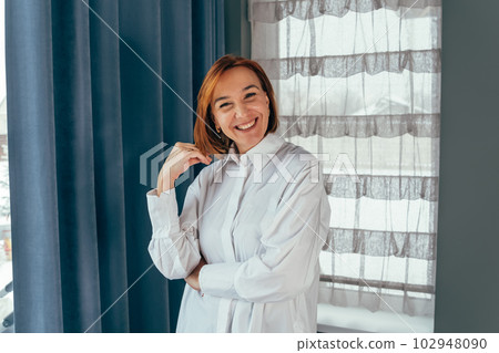 Beautiful serious caucasian business woman. Middle age business woman. 102948090