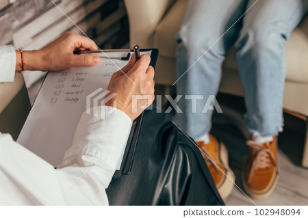 Close up interviewer interview candidate apply for job in office. Close up interviewer interview candidate apply for job in office. 102948094