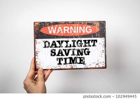 Daylight Saving Time. Warning sign with text on a white background 102949445