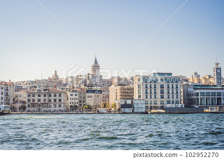 Istanbul city skyline in Turkey, Beyoglu district old houses with Galata tower on top, view from the Golden Horn 102952270