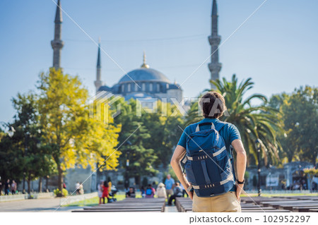 Man tourist enjoying the view Blue Mosque, Sultanahmet Camii, Istanbul, Turkey 102952297