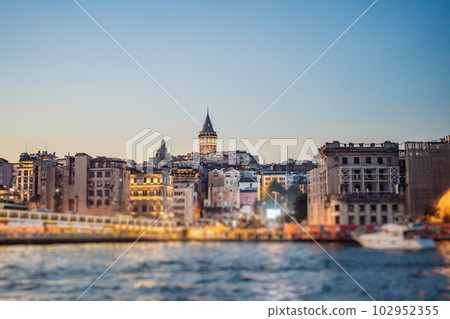 Istanbul city skyline in Turkey, Beyoglu district old houses with Galata tower on top, view from the Golden Horn Istanbul city skyline in Turkey, Beyoglu district old houses with Galata tower on top, view from the Golden Horn 102952355