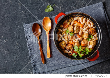 french cassoulet of chicken, sausages, white beans 102952725