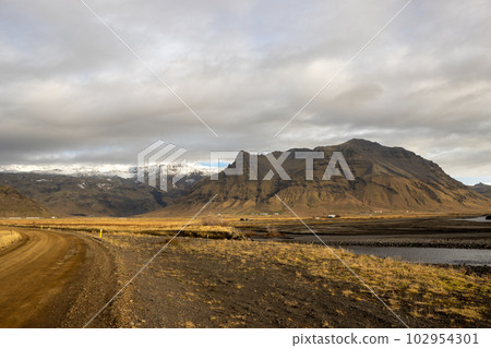 Country and mountains with snow, Iceland Country and mountains with snow, Iceland 102954301