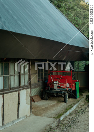 country house with old truck 102960393