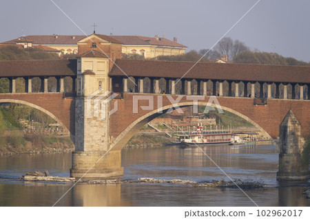 covered bridge over the Ticino river in Pavia at sunny day close up 102962017