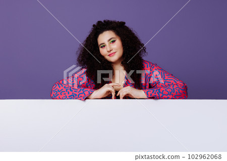 Plus size woman in bright suit 102962068