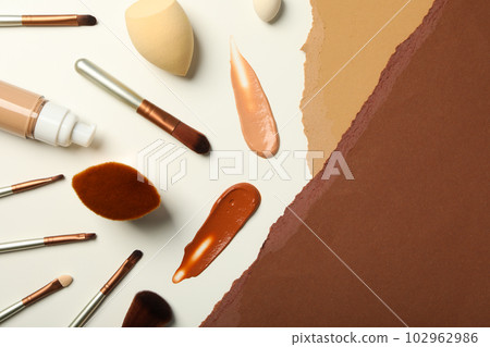 Concept of cosmetic and make up - foundation, top view 102962986