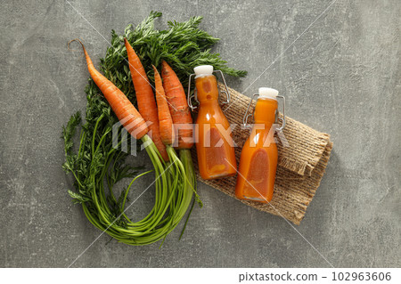 Concept of healthy nutrition and diet with Carrot juice 102963606