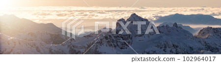 Snow Covered Mountain Tops in Canadian Nature Landscape. Aerial Panorama 102964017