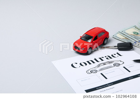 Concept of car purchase and insurance with toy car 102964108