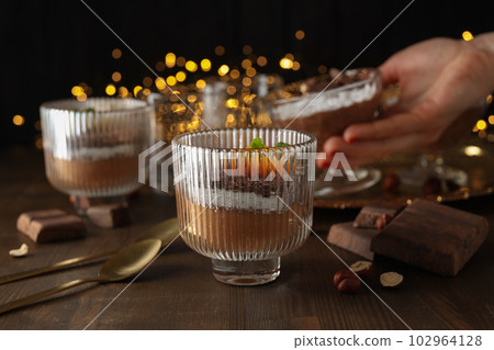 Concept of delicious and sweet food - chocolate mousse Concept of delicious and sweet food - chocolate mousse 102964128