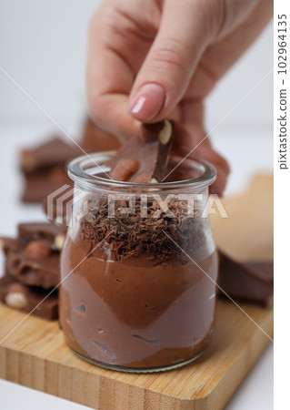 Concept of delicious and sweet food - chocolate mousse Concept of delicious and sweet food - chocolate mousse 102964135