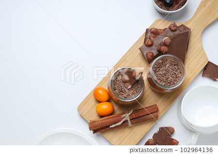 Concept of delicious and sweet food - chocolate mousse Concept of delicious and sweet food - chocolate mousse 102964136
