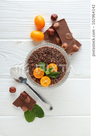 Concept of delicious and sweet food - chocolate mousse Concept of delicious and sweet food - chocolate mousse 102964142