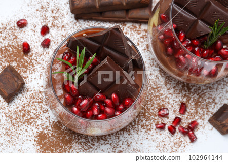 Concept of delicious and sweet food - chocolate mousse Concept of delicious and sweet food - chocolate mousse 102964144