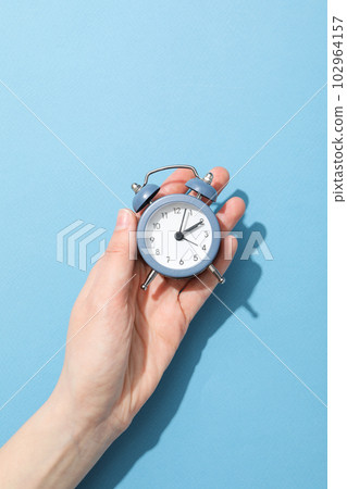 Concept of sleep and wake up with alarm clock Concept of sleep and wake up with alarm clock 102964157