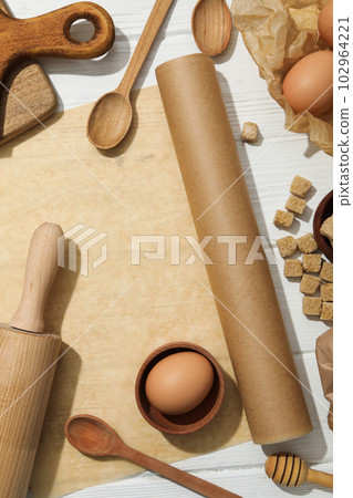 Concept of accessories for cooking and baking - baking paper 102964221