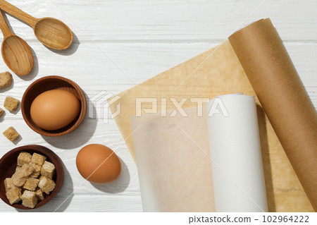 Concept of accessories for cooking and baking - baking paper Concept of accessories for cooking and baking - baking paper 102964222