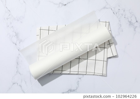 Concept of accessories for cooking and baking - baking paper Concept of accessories for cooking and baking - baking paper 102964226