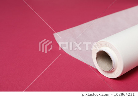 Concept of accessories for cooking and baking - baking paper 102964231