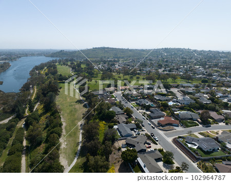 Aerial view of house around Lake Murray reservoir in San Diego, California 102964787
