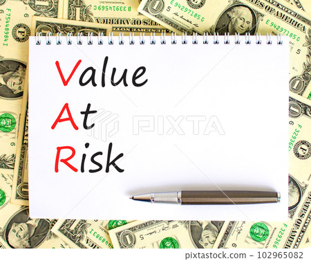 VAR Value at risk symbol. Concept words VAR Value at risk on beautiful white note. Dollar bills. Beautiful background from dollar bills. Business and VAR Value at risk concept. Copy space. VAR Value at risk symbol. Concept words VAR Value at risk on beautiful white note. Dollar bills. Beautiful background from dollar bills. Business and VAR Value at risk concept. Copy space. 102965082