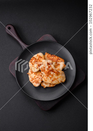 Delicious fried chicken meat chops with spices, salt and herbs Delicious fried chicken meat chops with spices, salt and herbs 102967232