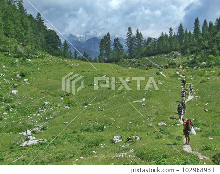 tourists travel in the mountains. hiking in the mountains. People traveling tourists travel in the mountains. hiking in the mountains. People traveling 102968931