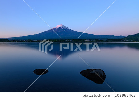 Mt.Fuji in early summer, upside-down Mt.Fuji in the early morning seen from Lake Kawaguchiko Mt.Fuji in early summer, upside-down Mt.Fuji in the early morning seen from Lake Kawaguchiko 102969462