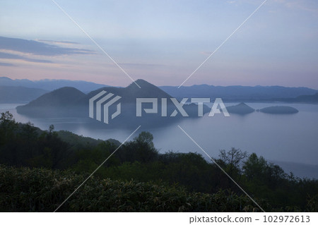 Lake Toya in early spring 102972613