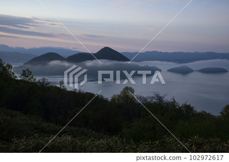 Lake Toya in early spring 102972617