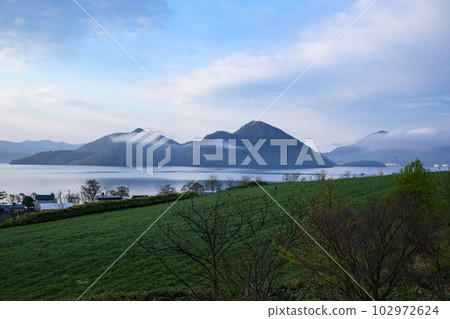 Lake Toya in early spring 102972624