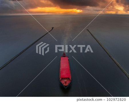 Aerial drone panoramic photo of industrial crude oil and fuel tanker ship cruising deep blue open ocean sea 102972820