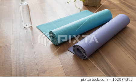 yoga mat and bottled water yoga mat and bottled water 102974393