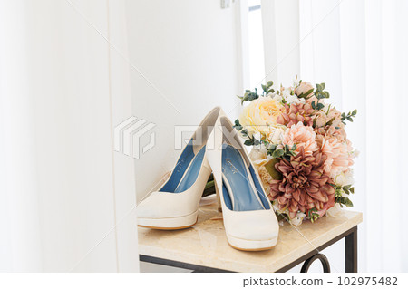 Bouquet and bridal shoes image wedding material Bouquet and bridal shoes image wedding material 102975482