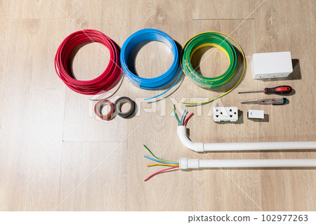 Electrician repair wire in PVC Conduit , renovate home . 102977263