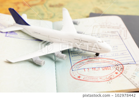 Visa and passport document to immigration at airport in country. 102978442